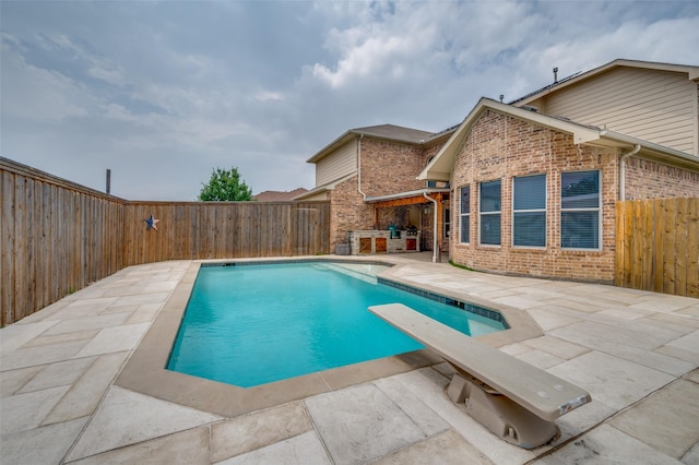 13274 Bayfield Dr, Frisco, TX 75033 - view of pool with a patio, a fenced backyard, and a diving board