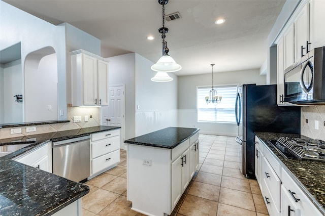 13274 Bayfield Dr, Frisco, TX 75033 - kitchen featuring dishwasher, a center island, black gas cooktop, backsplash, and recessed lighting