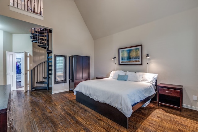 15630 Stonebridge Dr, Frisco, TX 75035 - bedroom featuring high vaulted ceiling, baseboards, and wood finished floors
