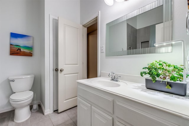 15630 Stonebridge Dr, Frisco, TX 75035 - bathroom featuring vanity, toilet, tile patterned floors, and baseboards