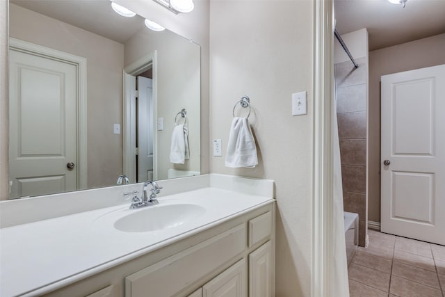 15630 Stonebridge Dr, Frisco, TX 75035 - full bathroom with vanity, tile patterned flooring, and shower / bath combo with shower curtain
