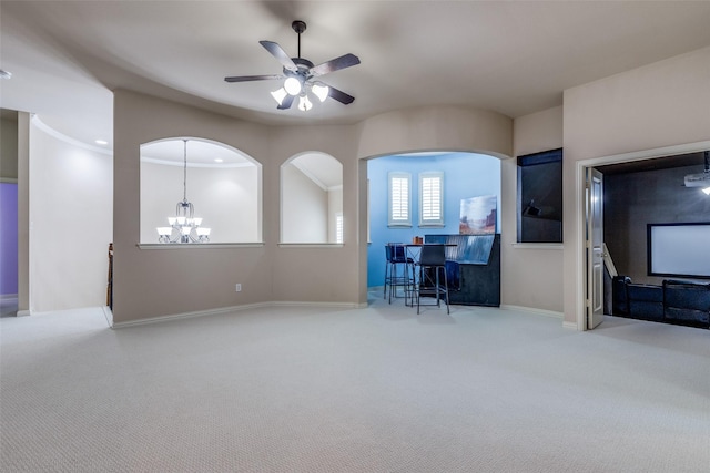 15630 Stonebridge Dr, Frisco, TX 75035 - unfurnished living room featuring carpet, a ceiling fan, a chandelier, and baseboards