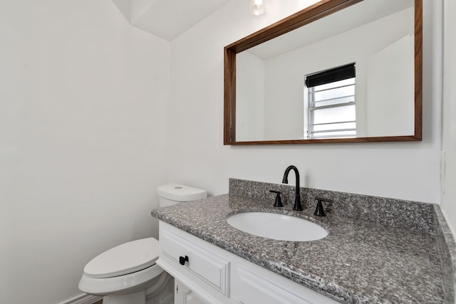 2005 Westshore Dr, Garland, TX 75043 - bathroom featuring toilet and vanity