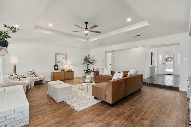 2005 Westshore Dr, Garland, TX 75043 - living room with a raised ceiling, a ceiling fan, dark wood-style flooring, recessed lighting, and baseboards