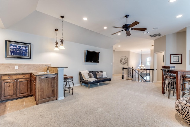 2758 Sharlis Dr, Frisco, TX 75036 - living room featuring vaulted ceiling, light carpet, a chandelier, recessed lighting, and ceiling fan