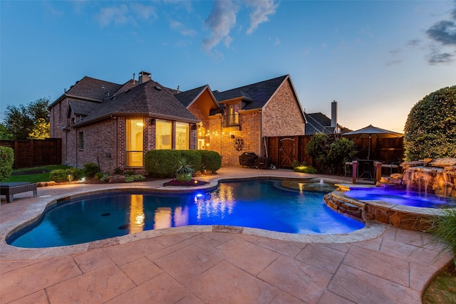 2758 Sharlis Dr, Frisco, TX 75036 - view of pool with a patio area, a pool with connected hot tub, and a fenced backyard