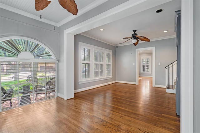 6843 Casa Loma Ave, Dallas, TX 75214 - unfurnished living room with a ceiling fan, plenty of natural light, wood finished floors, crown molding, and recessed lighting