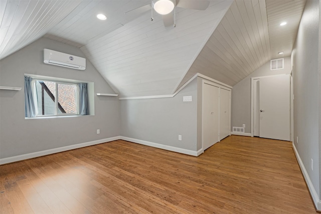 6843 Casa Loma Ave, Dallas, TX 75214 - bonus room featuring an AC wall unit, hardwood / wood-style flooring, baseboards, lofted ceiling, and recessed lighting