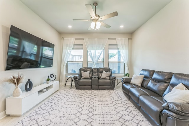 6313 Hedgecoxe Rd, The Colony, TX 75056 - living room with ceiling fan, baseboards, and recessed lighting