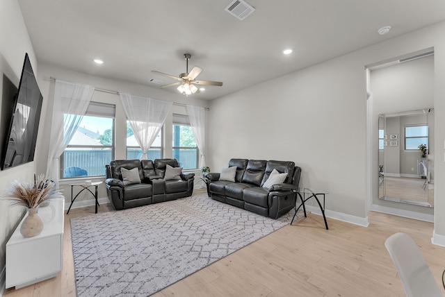 6313 Hedgecoxe Rd, The Colony, TX 75056 - living area with a ceiling fan, light wood finished floors, baseboards, and recessed lighting