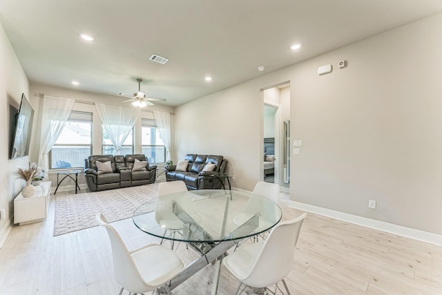6313 Hedgecoxe Rd, The Colony, TX 75056 - dining area with baseboards, a ceiling fan, recessed lighting, and light wood-type flooring
