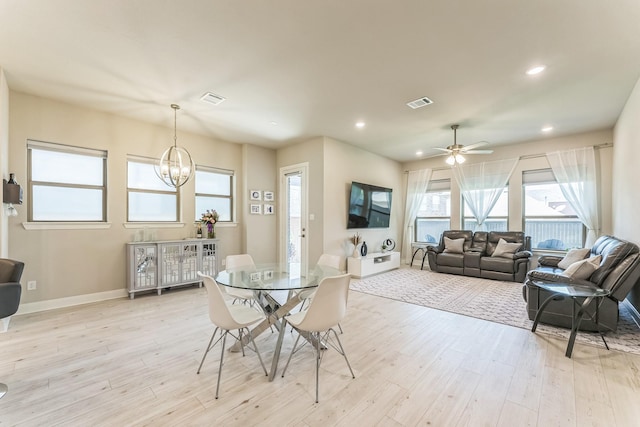 6313 Hedgecoxe Rd, The Colony, TX 75056 - dining area featuring light wood finished floors, a chandelier, plenty of natural light, baseboards, and recessed lighting