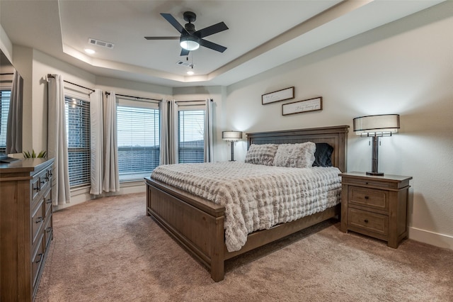 1405 Thunder Dove Dr, Mansfield, TX 76084 - bedroom featuring light carpet, a tray ceiling, baseboards, and a ceiling fan