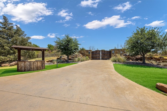 14250 Chaparral Ln, Roanoke, TX 76262 - view of concrete surface featuring a gate and a gated entry