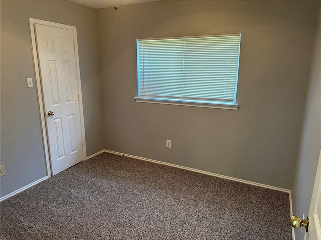 1512 Straus Rd, Cedar Hill, TX 75104 - empty room featuring carpet floors and baseboards
