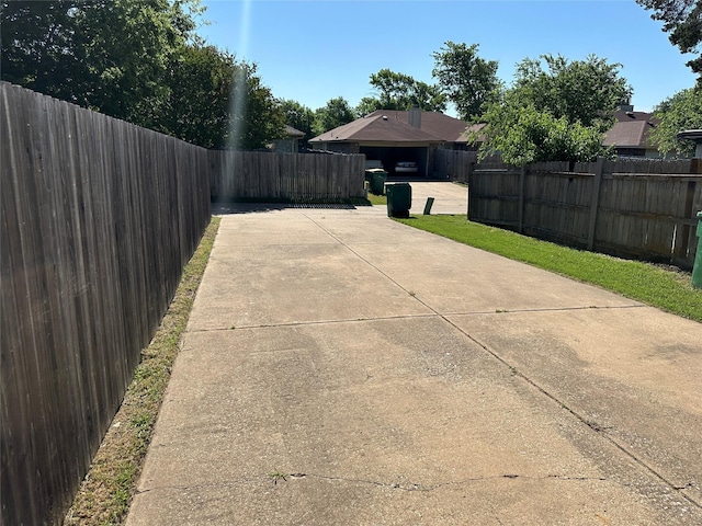 1512 Straus Rd, Cedar Hill, TX 75104 - fenced backyard featuring a patio area