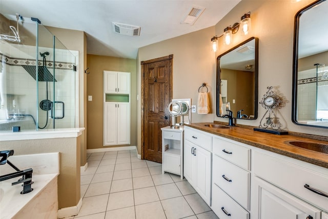 140 Daisey Ln, Justin, TX 76247 - full bathroom featuring a shower stall, tile patterned flooring, double vanity, and a garden tub