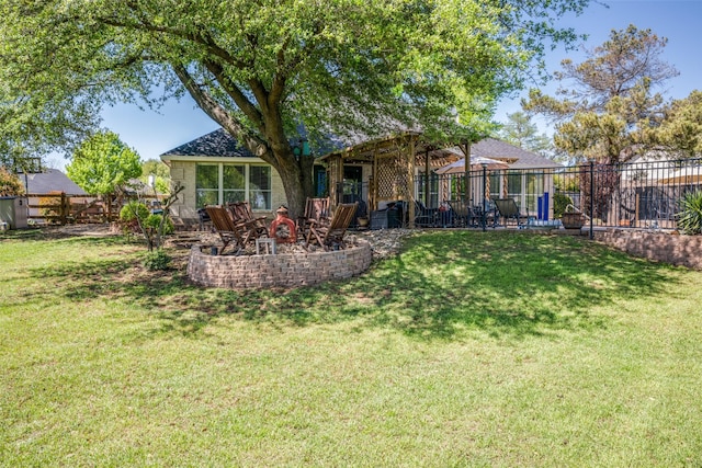 140 Daisey Ln, Justin, TX 76247 - back of property featuring an outdoor fire pit and a patio area
