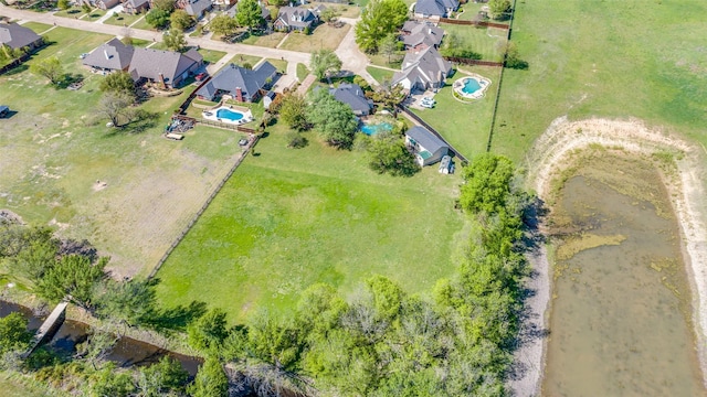 140 Daisey Ln, Justin, TX 76247 - aerial perspective of suburban area with a pool area