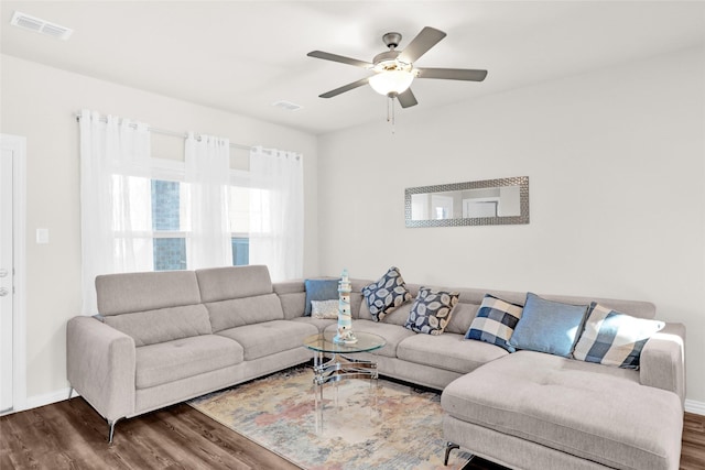 4925 Westhill Dr, Princeton, TX 75071 - living room featuring wood finished floors, a ceiling fan, and baseboards