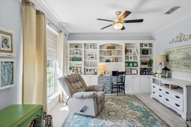 552 Heritage Ct, Canton, TX 75103 - office space with ceiling fan, light wood finished floors, crown molding, and built in study area