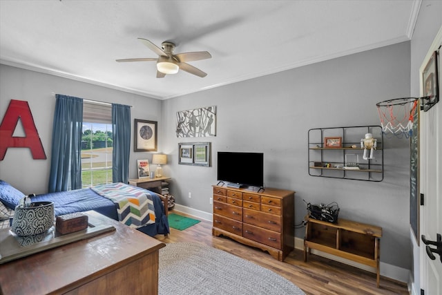 552 Heritage Ct, Canton, TX 75103 - bedroom featuring crown molding, wood finished floors, baseboards, and ceiling fan