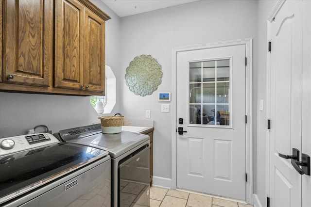 552 Heritage Ct, Canton, TX 75103 - laundry room with cabinet space, washing machine and clothes dryer, baseboards, and light tile patterned flooring
