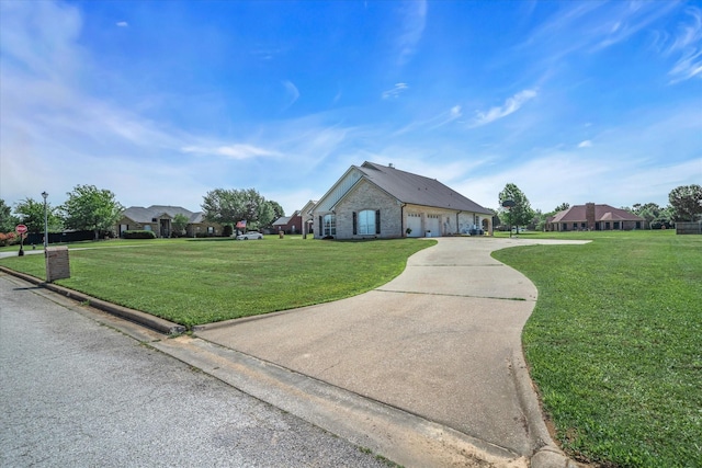552 Heritage Ct, Canton, TX 75103 - view of front of property with a front lawn, concrete driveway, and brick siding