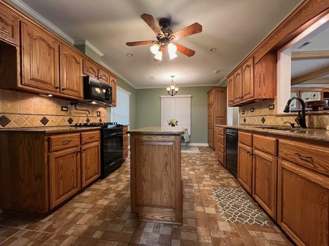 1509 W Hull St, Denison, TX 75020 - kitchen with black appliances, a sink, a center island, backsplash, and crown molding