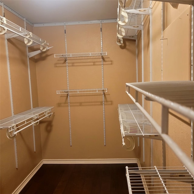 1509 W Hull St, Denison, TX 75020 - spacious closet featuring wood finished floors