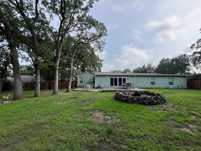 1509 W Hull St, Denison, TX 75020 - rear view of property with a patio