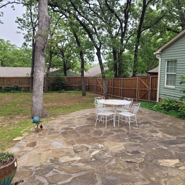 1509 W Hull St, Denison, TX 75020 - view of patio featuring outdoor dining area