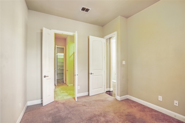1001 Vineyard Dr, Euless, TX 76039 - unfurnished bedroom featuring light colored carpet and baseboards