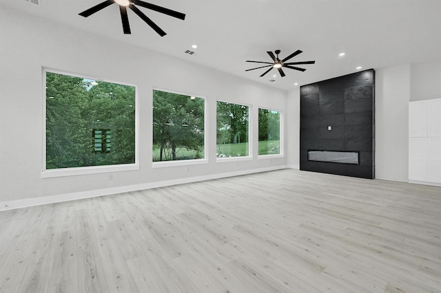 320 Bentwood Dr, Pottsboro, TX 75076 - unfurnished living room featuring ceiling fan, wood finished floors, recessed lighting, and a fireplace