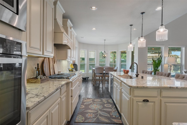 760 Ascot Ct, Prosper, TX 75078 - kitchen with a sink, appliances with stainless steel finishes, cream cabinets, recessed lighting, and backsplash