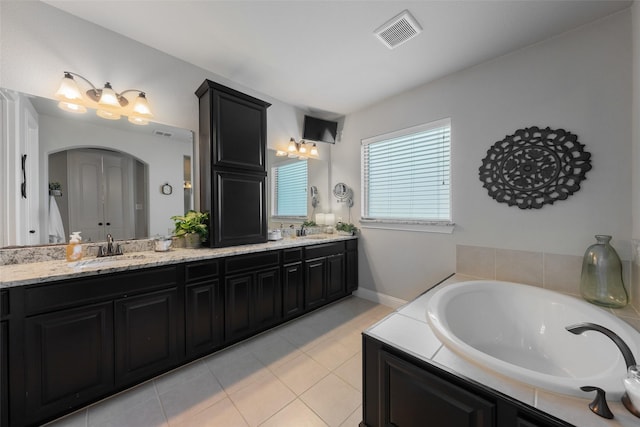 760 Ascot Ct, Prosper, TX 75078 - bathroom with double vanity, a bath, and tile patterned flooring