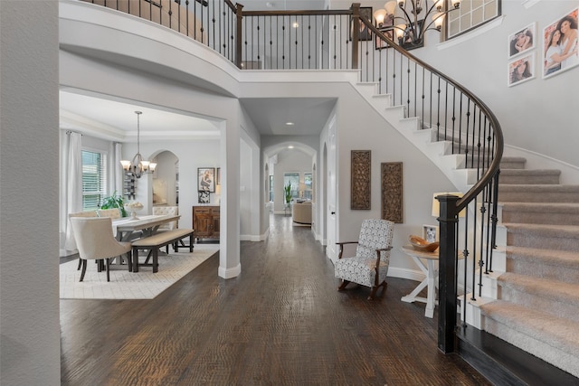 760 Ascot Ct, Prosper, TX 75078 - entrance foyer with a chandelier, baseboards, wood finished floors, stairs, and a towering ceiling