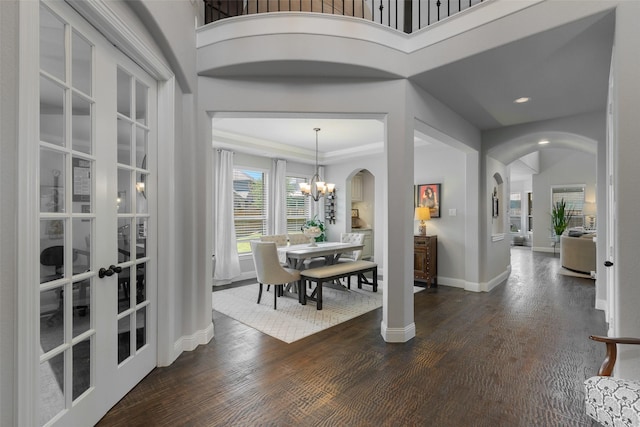 760 Ascot Ct, Prosper, TX 75078 - dining room with arched walkways, baseboards, dark wood-style floors, recessed lighting, and a chandelier