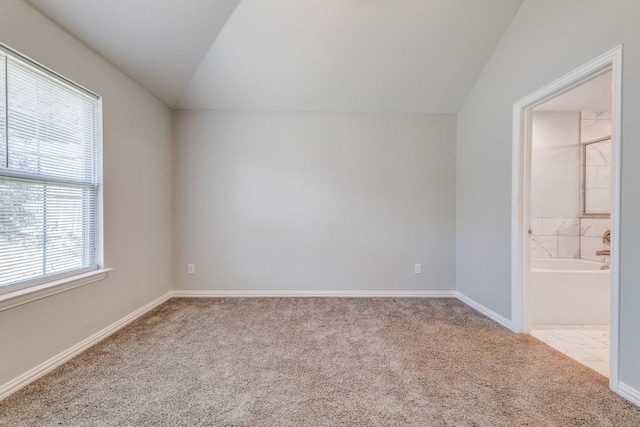 5520 Curzon Ave, Fort Worth, TX 76107 - unfurnished room with plenty of natural light, carpet flooring, vaulted ceiling, and baseboards