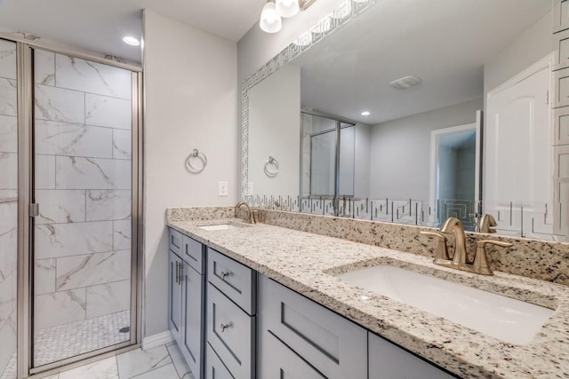 5520 Curzon Ave, Fort Worth, TX 76107 - full bathroom featuring marble finish flooring, a shower stall, double vanity, recessed lighting, and baseboards