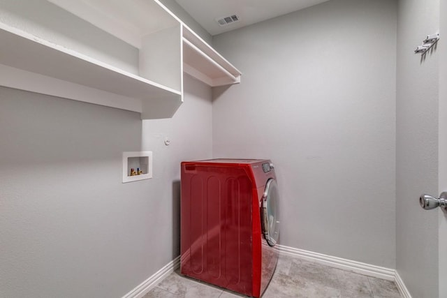 5520 Curzon Ave, Fort Worth, TX 76107 - laundry area featuring baseboards and washer / dryer