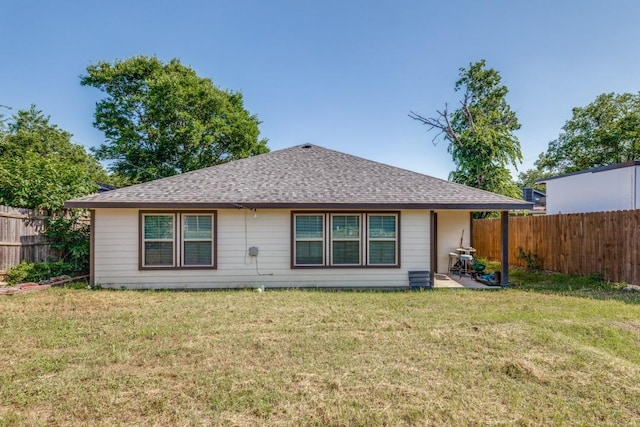 5520 Curzon Ave, Fort Worth, TX 76107 - rear view of house with a shingled roof and a patio