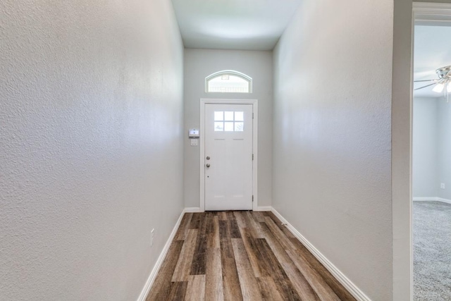 5520 Curzon Ave, Fort Worth, TX 76107 - entryway with wood finished floors, baseboards, a ceiling fan, and a textured wall
