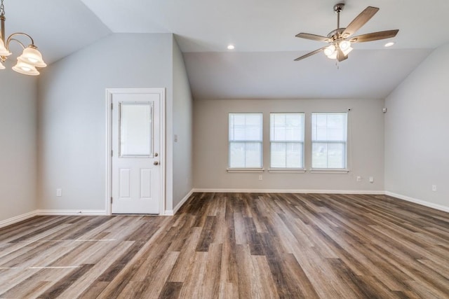 5520 Curzon Ave, Fort Worth, TX 76107 - unfurnished living room with vaulted ceiling, a chandelier, wood finished floors, a ceiling fan, and baseboards