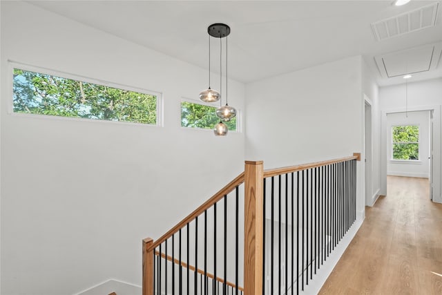 2820 Barnes Bridge Rd, Dallas, TX 75228 - hallway with attic access, light wood-style flooring, an upstairs landing, and recessed lighting