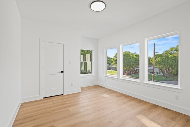 2820 Barnes Bridge Rd, Dallas, TX 75228 - spare room featuring light wood-type flooring and baseboards