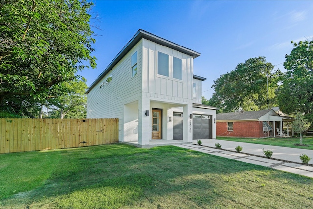 2820 Barnes Bridge Rd, Dallas, TX 75228 - contemporary house featuring driveway, board and batten siding, and a garage