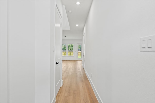 2820 Barnes Bridge Rd, Dallas, TX 75228 - hallway with light wood-style flooring, recessed lighting, and baseboards