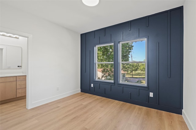 1332 Fletcher St, Dallas, TX 75223 - spare room featuring light wood-style flooring and baseboards