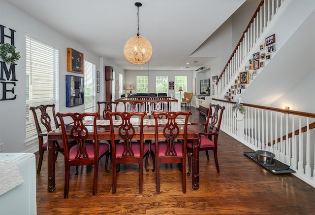 1015 W Bluff St, Fort Worth, TX 76102 - dining area featuring wood finished floors, a chandelier, recessed lighting, and stairs